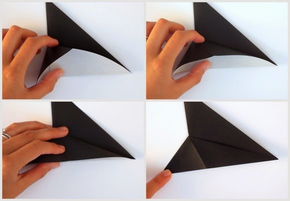 Оригами кошка-вставьте палец в уголок и расправьте его