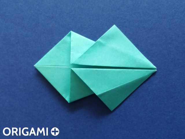 Оригами рибка-раскройте верхние клапаны