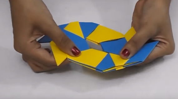 Оригами звезда ниндзя-вытяните уголки